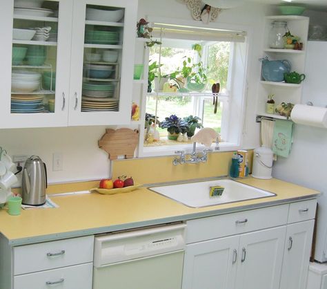 retro+kitchen+1940 | Maile remodels a dark 1970s kitchen into a sunny 1940s delight...yellow counter top 1940s Kitchen Remodel, Vintage Yellow Kitchen, 1940s Kitchen, 1970s Kitchen, Revere Pewter, Retro Renovation, Yellow Kitchen, Vintage Kitchen Decor, Kitchen Redo