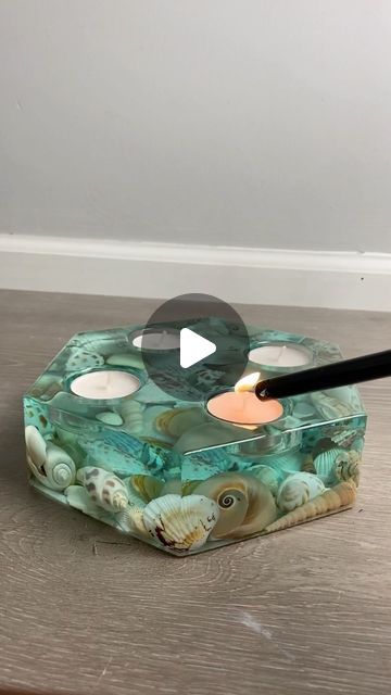 Jennifer Chapman on Instagram: "I added a few pieces of work to my Etsy yesterday and this gorgeous candle holder was one of them.   @totalboat thickset fathom resin  @aajmolds silicone mold    #artwork #artstagram #art #instart #beachlife #beachart #ocean  #resin  #resinartist #epoxyresin  #epoxyresin  #resinartist #resinart #epoxy g #beachlife  #beachpainting #abstractart_daily #shells #candles #candleholder #relaxing #beachhouse #satisfying #satisfyingvideos #satisfyingreels #etsyseller" Resin Candle Holder, Ocean Resin, Beach Painting, Beach Art, Daily Art, Silicone Mold, Resin Art, Epoxy Resin, Silicone Molds