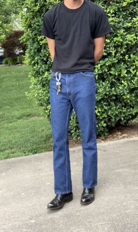 Wide Fit Jeans Outfit Men, Styling Cowboy Boots With Jeans, Compression Shirt Outfit Aesthetic, Levi’s 505 Outfit Men, Levis 517 Outfit Men, Men’s Surfer Fashion, 90s Minimalism Fashion Men, Jeans With Boots Men, 90s Men’s Fashion