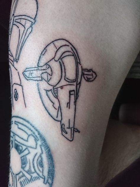 Did this last night slave 1 and boba fett well pleased how it's come out... Star Wars Hand Tattoo, Mandalorian This Is The Way Tattoo, Boba Fett Tattoo Ideas, Boba Fett Tattoo Design, Starwars Lego Tattoo, Boba Fett Ship Tattoo, Star Wars Boba Fett Tattoo, Star Wars Ankle Tattoo, Boba Fett Tattoo Black And White