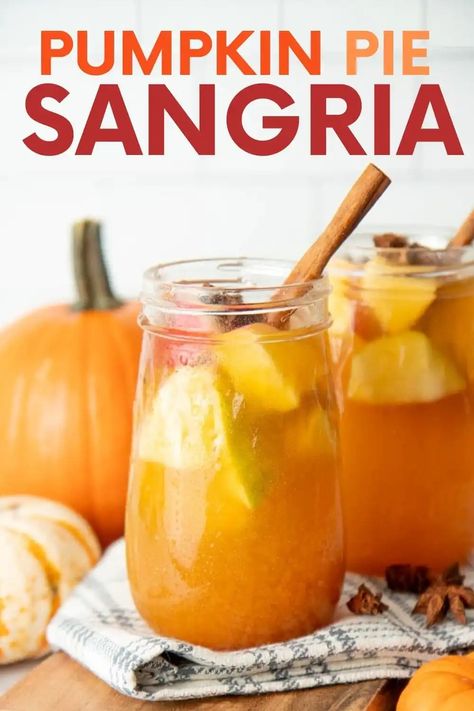 Sweet, spiced, and full of autumnal flavor, this Pumpkin Spice Fall Sangria is perfect for pumpkin carving, Thanksgiving, or anytime! Pumpkin Sangria Recipe, Thanksgiving Cocktails For A Crowd, Cocktails For A Crowd, Sweaters Colorful, Pumpkin Pie Syrup, Fall Sangria Recipes, Pumpkin Wine, Yummy Summer Drinks, Pumpkin Carving Party