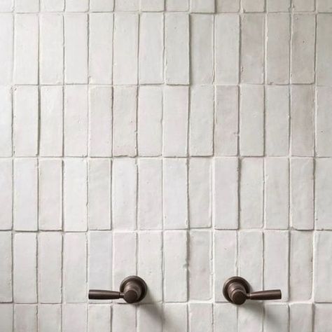 STUDIO SHIZEN | ARCH & INTERIOR DESIGN STUDIO on Instagram: "Moroccan Zelige tiles is a trend that’s here to stay. Zellige tiles are made out of non-refined natural clay which is extracted in the region of Fez (Morocco). When laid, they have a breathtaking undulating surface that almost looks like the surface of a rippling pond. #moroccantiles #zelige #bathroomdesign #walltiles #timelessdecor #white #vintage #interiordesign #dubai" Fez Morocco, Arch Interior, Moroccan Tiles, Timeless Decor, Zellige Tile, Interior Design Studio, Wall Tiles, Bathroom Design, Interior Design