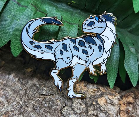 This Yutyrannus pin has only two places he likes to be: In the cold snow, or being with you!  Time to give him a home. Design 100% made by me.  Hard Enamel Pins made with a zinc alloy base.  Size: 5 cm x 4,5 cm Shipped from Germany. Every order comes with a tracking code. Fridge Design, Dinosaur Images, Nerd Fashion, Dinosaur Stickers, Dinosaur Art, Cool Pins, Cute Dinosaur, Metal Pins, Hard Enamel Pin