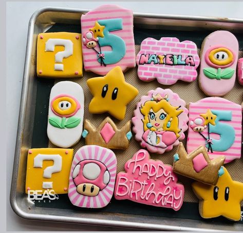 Princess peach theme decorated sugar cookies for Nayeila’s 5th birthday 💓💓💓💓 #sugarcookies #sugarcookiesofinstagram #princesspeach #princesspeachcookies #decoratedcookies #galletasdecoradas Princess Peach Sugar Cookies, Princess Peach Cookies, Peach Sugar Cookies, Peach Cookies, Mario And Princess Peach, 7 Birthday, Decorated Sugar Cookies, Cake Cookie, Sugar Cookies Decorated