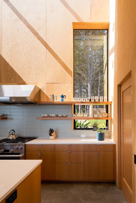 Kitchen, Concrete Floor, Wall Oven, Refrigerator, Wood Cabinet, Range Hood, Engineered Quartz Counter, and Cooktops The kitchen is outfitted with a Wolf stove and hood, Hansgrohe faucet, and Sugatsune cabinetry hardware. Ranch Retreat, Cabinetry Hardware, Sea Ranch, California Living, Coastal Retreat, Coastal Kitchen, Fall 24, California Coast, Beautiful Kitchens