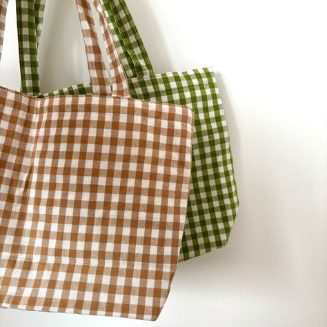 Introducing our charming gingham bag, now available in both biscuit and sage! Perfect for adding the final touch to any outfit. Which color is your favourite? #gingham #ginghamcheck #ginghamstyle #ginghamfresh #ginghambag #ginghambags #bag #bags #springbag #springbags #smallbusiness Gingham Tote Bag, Gingham Bag, Gingham Fashion, Spring Bags, Green Gingham, Red Gingham, Final Touch, Gingham Check, Gingham