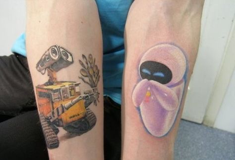 wall-e & eve couple tattoo Walle And Eve Tattoos, Walle And Eve, Tattooed Couples, Eve Tattoo, Marriage Tattoos, Wall E And Eve, Cool Tattoos For Girls, Wall E Eve, Back Piece Tattoo