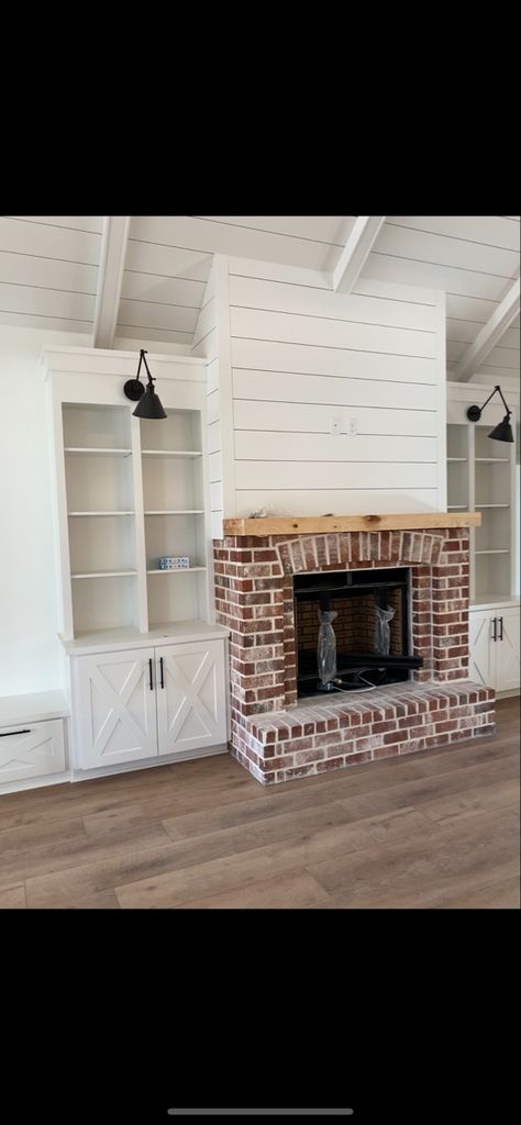 Red Brick Fireplace With Built Ins, Brick Fireplace With Shiplap Above, Shiplap Fireplace Built Ins, Fireplace With Built Ins On Both Sides Farmhouse, Half Brick Fireplace, Brick Fireplace With Shiplap, Red Brick Fireplace Living Room, Shiplap And Brick Fireplace, Shiplap Over Brick Fireplace