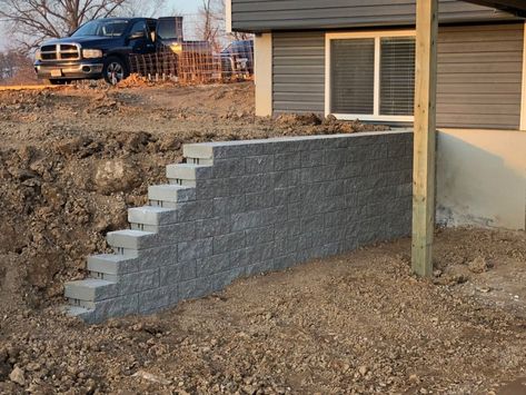 How Can a #RetainingWall Transform Your Sloped Yard? 🤔  

Retaining walls not only add beauty to your #landscape, but they also offer practical benefits such as slowing down erosion, creating flat, usable space, and improving drainage. 👍

Is your yard on a slope? 📞 Call us at (618) 205-9930 to schedule a consultation today! Deck On A Hill Sloped Yard, Retaining Walls On A Slope, Retaining Wall Ideas Hillside Backyard, Yard On A Slope, Natural Rock Retaining Wall, Backyard Slope Landscaping, Retaining Wall Ideas Hillside, Building On A Slope, Slope Backyard