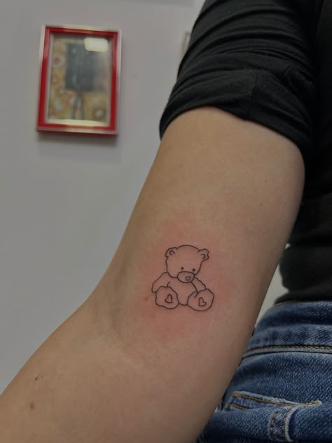 Teddy Bear Ankle Tattoo, Teddy Bear Holding Flowers Tattoo, Bear Holding Flowers Tattoo, Childhood Teddy Tattoo, Fine Line Bear Tattoo, Teddy Tattoo, Dreamer Tattoo, Teddy Bear Tattoo, Button Tattoo