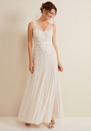 12 best casual wedding dresses 2023: Simple & low-key bridal gowns for a small ceremony | HELLO! Casual Wedding Dress Not White, Wedding Dress Age 40 Older Bride, Floor Length Wedding Dress No Train Simple, Simple Wedding Dress For Short Bride, Casual Wedding Dress Over 40, Wedding Dress For Tomboy Brides, Casual Beach Wedding Dresses Simple, Wedding Dress For 2nd Marriage Simple, Informal Wedding Dress Casual Simple