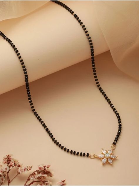 Buy beautiful and charming mangalsutra chains from our gold and diamond collection. Traditional Mangalsutra Designs Gold, Black Beads Mangalsutra Design Simple, Karimani Chain Designs, Small Mangalsutra, Mangalsutra Designs Gold, Emerald Stone Rings, Mangal Sutra, Mangalsutra Chain, Mangalsutra Design