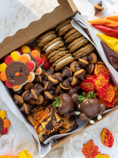 From marbled leaf cookies to chocolate covered strawberry turkeys, these Thanksgiving treat boxes are perfect for the holidays! Thanksgiving Treat Boxes, Chocolate Covered Strawberry Turkeys, Strawberry Turkeys, Turkey Sugar Cookies, Pumpkin Cheesecake Brownies, Covered Strawberry, Leaf Cookies, Chocolate Covered Strawberry, Thanksgiving Treats