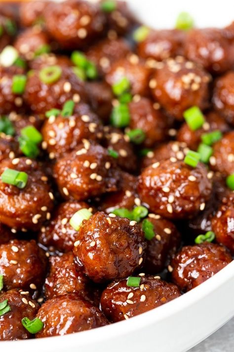 close up of mongolian beef meatballs showing only balls Asian Meatballs Crockpot, Mongolian Beef Meatballs, Meatballs Crock Pot, Mongolian Meatballs, Frozen Meatballs Crockpot, Cooking Frozen Meatballs, Frozen Meatball Recipes, Honey Garlic Meatballs, Meatball Recipes Crockpot