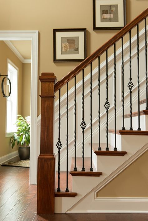 Craftsman Staircase with High ceiling, Wainscotting, Chair rail, Hardwood floors Stairway Railing Ideas, Craftsman Staircase, Wrought Iron Stair Railing, Stair Banister, Iron Staircase, Iron Stair Railing, Wrought Iron Stairs, Wood Railing, Stair Railing Design