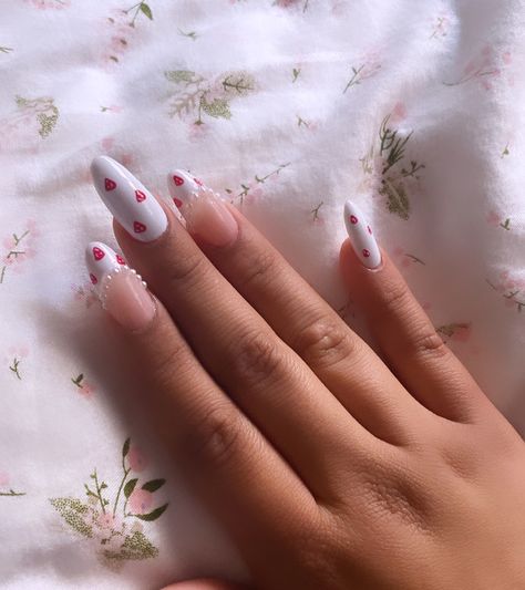 Strawberry pearl nails #nailart #nailideas #nails #coquettenails #strawberry #pink #red #white #fashion #aesthetic #coquette #lana #lanadelrey #gelnails #whitenails #oval #almondnails White Nails With Strawberries, Nails With Strawberries, White Fashion Aesthetic, Strawberry Pink, Pearl Nails, Aesthetic Coquette, Fashion Aesthetic, Nails Nailart, White Fashion