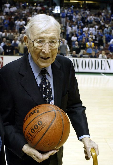 Legendary coach John Wooden walks the court during the John R. Wooden Classic as Kentucky defeated UCLA 52-50 in the John R. Wooden Classic on December 6, 2003 at the Arrowhead Pound in Anaheim, California. Quotes About Leadership, Ucla Campus, College Basketball Players, John Wooden, Anaheim California, Leadership Quotes, College Basketball, Super Sport, The Court