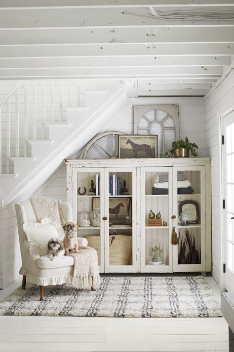 Maximize the space under your stairs with these clever storage ideas. #storageideas #underthestairstorage #staircaseideas Clever Storage Ideas, تحت الدرج, Muebles Shabby Chic, Mud Room Storage, Understairs Storage, White Farmhouse, Stair Storage, Cozy Reading Nook, Clever Storage