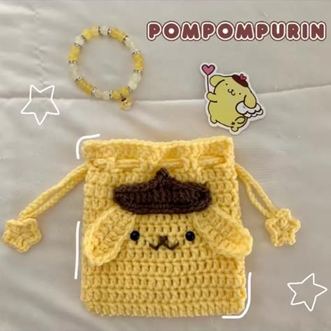 Pompompurin pouch༺☆༻ • Handmade by me • includes... - Depop Crochet Patterns Pouch, Pompompurin Bracelet, Crochet Pompompurin, Crochet Projects Ideas, Art Stall, Cute Crochet Ideas, Crochet Wallet, Pom Pom Purin, Stickers Handmade