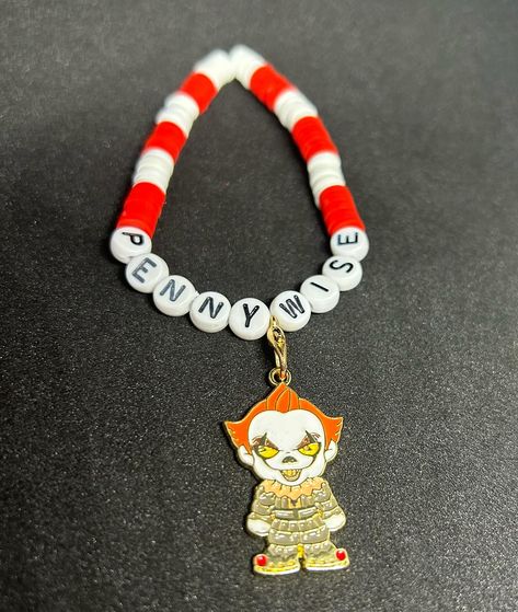 Pennywise (Horror Film) Heishi Bracelet #handmadebracelet #heishibracelets #beadedbracelets #bracelets #personalizedbracelets #personalizedbracelet #prnnywise #pennywisecosplay #pennywisetheclown #pennywise🎈 #pennywise🤡 #horrorfilm #charmbracelets #charmbracelet #danglebracelet #danglebracelets It Bracelets, Bill Pay, Heishi Bracelet, Pennywise The Clown, Kandi Ideas, Dangle Bracelet, Clay Bead, Horror Film, Movie Character