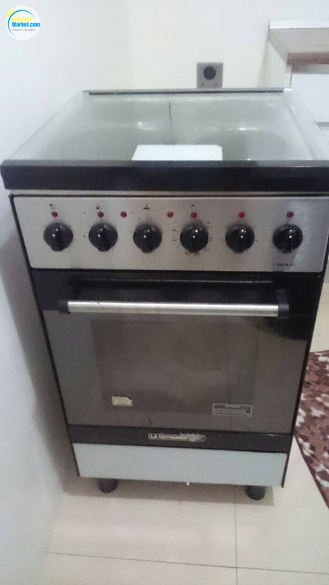 La Germania FS5004 40XR Gas Range 4 Electric Hotplates  Already used but rarely  4 Electric Hotplate  Electric Oven, thermostat control  Electric Grill with Rotisserie  Oven light, Stainless on top  Glass top cover and Double glass oven door  Original price was P40,000. Rotisserie Oven, Electric Grill, Double Glass, Electric Oven, Gas Range, Kitchen Reno, Free Post, Job Posting, Thermostat