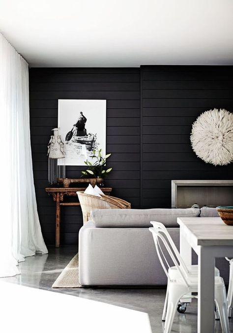 a Scandinavian living room with a black shiplap accent wall that makes a statement in this neutral space Shiplap Living Room, Dark Accent Walls, Tongue And Groove Walls, Black Accent Walls, Dark Paint Colors, Shiplap Accent Wall, Revere Pewter, Small Space Design, White Shiplap