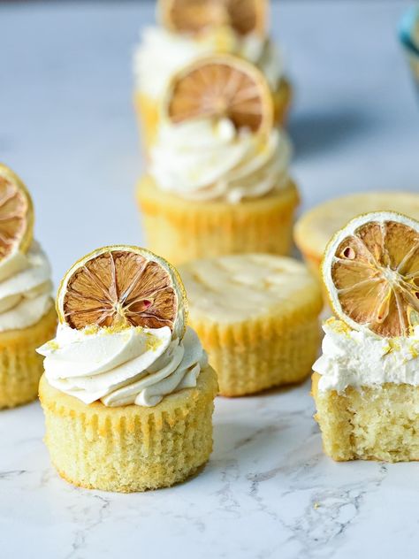 several lemon drizzle cupcakes arranged on a marble surface together. Lemon Drizzle Cupcakes, Lemon Drizzle, Cupcakes Recipe, Marble Surface, Cupcake Recipes, Sweet Tooth, Lemon, Marble