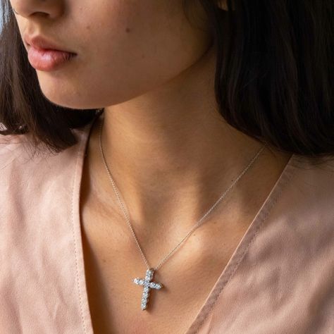 This cross shaped pendant is beautifully crafted with dazzling shared prong-set diamonds. Handcrafted in Hatton Gardens, London. Diamond Cross Pendants, Diamond Cross, Fine Jewellery, Diamond Pendant, Cross Pendant, Prong Setting, Fine Jewelry, Diamonds, White Gold