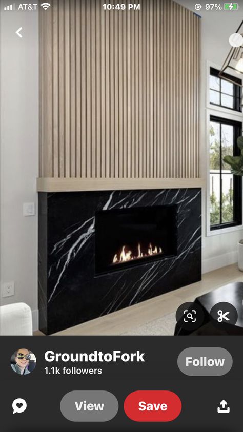 Mid Century Modern Fireplace Update, Morden Fireplace Wall, Ribbed Wood Fireplace, Modern Fireplace Backsplash, Modern Wood Slat Fireplace Wall, Wood Slat Fireplace Wall Living Room, Slat Wall Above Fireplace, Midcentury Modern Electric Fireplace, Slat Wall Fireplace Ideas