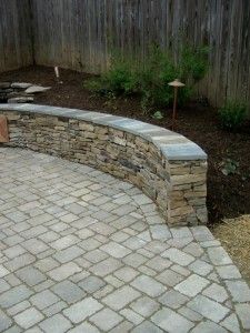 Stone Wall Lighting, Patio Stone Wall, Fall Lawn Maintenance, Stone Seating, Patio Walls, Sitting Wall, Flagstone Steps, Seating Wall, Paver Ideas