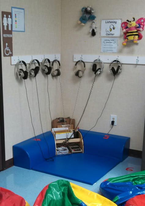 My new listening center corner!  The hooks have made for a much neater and organized area!!! Listening Corner, Listening Center Ideas, Music Corner Preschool, Listening Center Preschool, How To Store Headphones In A Classroom, Classroom Listening Center, Classroom Headphone Storage Kindergarten, Reading Corner Classroom, Flexible Seating Classroom