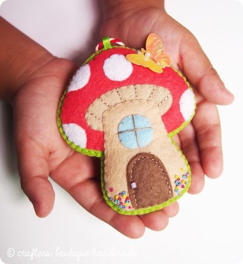 This handmade felt decoration looks a lot like the mushroom houses in Smurf Village! | free felt craft pattern from Crafters Boutique Handmade Spring Sewing Projects, Easy Felt Crafts, Mushroom Cottage, Felt Craft Projects, Spring Sewing, Felt Mushroom, Felt Ornaments Patterns, Baby Mobil, Mushroom Pattern