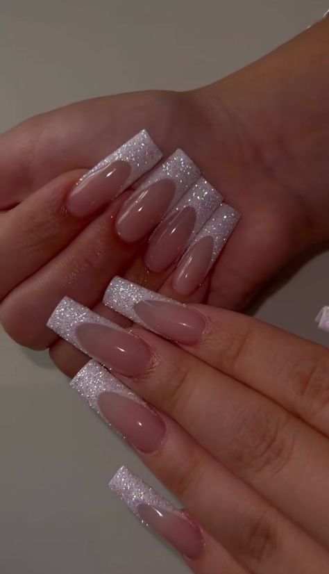 Simple Glitter French Tip Nails, French Nail Designs Sparkle, Glitter New Year Nails, Nye French Nails, White Glitter Prom Nails, New Years Coffin Acrylic Nails, White French Tip Acrylic Nails With Glitter, Long Glittery Nails, Super Glittery Nails