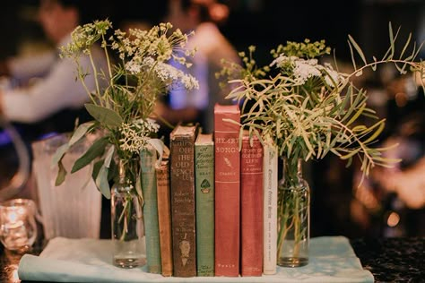 An intimate queer lady seaside meets enchanted library wedding Storybook Wedding Decor, Literature Wedding, Forest Library, Enchanted Library, Christmas Library, Book Themed Wedding, Literary Wedding, Library Themes, Queer Weddings