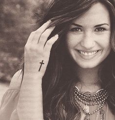 Cross tattoo--demi lovato ❤ Cross On Hand Tattoo Women, Cross Hand Tattoo, Demi Lovato Tattoos, Cross Tattoo On Hand, Tattoo Side, Cross Tattoo On Wrist, Small Cross Tattoos, Cross Tattoos For Women, Hand Tattoos For Women