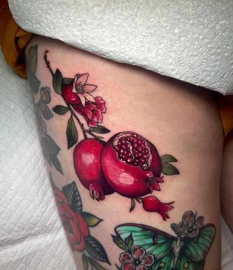 • Pomegranate’s • . . . . Pomegranate gap filler above a healed Luna moth from a few years ago. . #tattoo #femaletattooartist… | Instagram Scarlett Begonias Tattoo, Neotrad Back Tattoo, Food Lover Tattoo, Pomegranate Branch Tattoo, Pomegranate Tree Tattoo, Pomagranet Tattoo Simple, Traditional Pomegranate Tattoo, Pomegranate Tattoo Simple, Traditional Fruit Tattoo