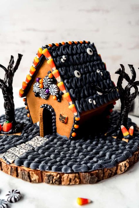 A Halloween Gingerbread House is a fun, festive way to get in the spooky spirit! Make it haunted or happy with your favorite candy decorations and black, orange, or white gingerbread house icing! #Halloween #gingerbread #gingerbreadhouse #best #easy #fun #fromscratch #homemade #icing #decoratingideas #haunted White Gingerbread House, Gingerbread House Icing, Haunted Gingerbread House, White Gingerbread, Halloween Gingerbread House, Halloween Gingerbread, Gingerbread House Ideas, Gingerbread House Template, Gingerbread Dough