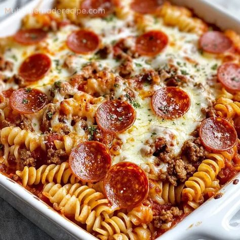 Baked Pizza Spaghetti is the perfect combination of pizza and pasta, with ground beef, pepperoni, and lots of mozzarella cheese baked into a deliciously cheesy dish. Pepperoni Baked Ziti, Pepperoni Pizza Bake, Cheesy Beef Pizza Casserole, Baked Pizza Casserole, Pepperoni Pasta Casserole, Easy Pizza Pasta Bake, Pepperoni Recipes Dinners, Pizza Pasta Bake Casserole, Pizza Bake Casserole