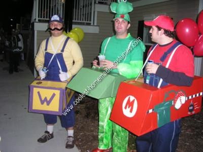 Homemade Mario Kart Costume: I made this homemade Mario Kart costume over the course of 2 months... I hand made all the cars from cardboard and painted them all with symbols or characters Mario And Luigi Halloween, Luigi Halloween Costume, Princess Daisy Costume, Mario Kart Costumes, Mario Halloween Costumes, Super Mario Costumes, Daisy Costume, Koopa Troopa, Mario Costume