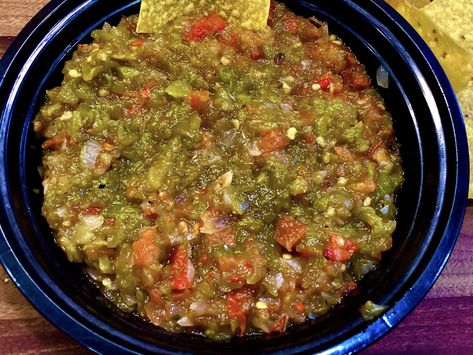 Introducing Roasted Hatch Green Chile Salsa – a zesty and aromatic condiment that celebrates the vibrant flavors of the Southwest. Made with the iconic Hatch green chiles, ripe tomatoes, pungent onion, and garlic, this salsa offers a perfect balance of heat and tanginess. A hint of lime adds a refreshing citrusy twist, while optional jalapenos […] Hatch Green Chile Salsa Recipes, Roasted Green Chili Salsa, Green Chile Salsa Recipe, Hatch Pepper Salsa, Hatch Green Chili Salsa, Chili's Salsa Recipe, How To Roast Hatch Green Chiles, Green Chile Salsa, Chunky Salsa Recipe