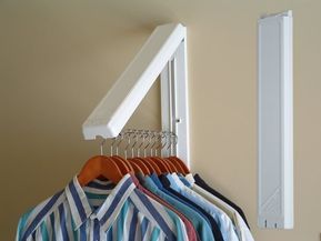 The InstaHanger installs into any wall using and rests flat against the wall when not in use. When open, it allows 12 inches of hanging space. It can to hold up to 60 lbs of clothes making it perfect for drying delicates in a laundry room or hanging extra coats when you have guests. Promising Review: "This is a great way to provide temporary hanging space. The hanging bar is a foot long and doesn't seem to mind the weight of any clothes I've hung up (including heavy jeans). It folds away disc... Laundry Closet Organization, Laundry Room Organization Storage, Utility Closet, Laundry Room Closet, Laundry Room Renovation, Clothes Hanging, Laundry Room Inspiration, Laundry Room Remodel, Laundry Closet