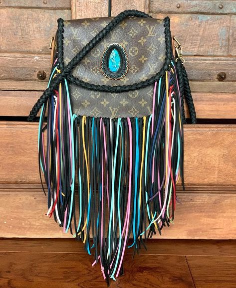 Classic Boho Bags on Instagram: “This custom bag with one of a kind turquoise piece and rainbow fringe came out gorgeous ❤️ so unique 😍#lv #louisvuitton #louisvuittonfringe…” Chic Tote Shoulder Bag With Fringe, Louis Vuitton Fringe Purse, Lv Fringe Purse, Leather Tote Shoulder Bag With Fringe, Louis Vuitton Bag Fringe, Rainbow Fringe, Tote Bag Diy, Fringe Tote Bag, Leather Ideas