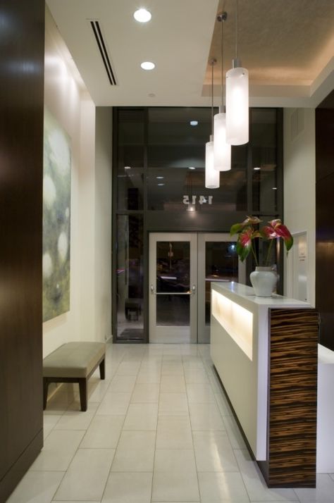 lobby Hotel Reception Desk, Inexpensive Countertops, Modern Hall, Desk Lighting, Rustic Counter, Modern Reception Desk, Dental Offices, Reception Desk Office, Commercial And Office Architecture