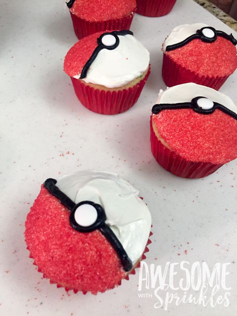 Poké Ball Cupcakes - Awesome with Sprinkles Pokemon Ball Cupcakes, Pokemon Birthday Party Cupcakes, Pokemon Birthday Cupcake Cake, Poke Ball Cupcakes, Diy Pokemon Cupcakes, Pokémon Birthday Food, Pokemon Dessert Ideas, Pokémon Birthday Cupcakes, Pokemon Cupcakes Ideas