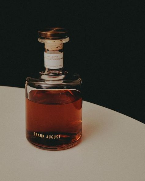 Frank August on Instagram: "We designed our bottle of Frank August through a lens of modernity and consciousness, believing less is more. While we are acutely aware that what’s inside our bottle is of paramount importance, we wanted the presentation and experience of our bottle to inspire a second life. Whether it be repurposed into a vase or reused as a decanter, let its story continue. #AmericasSpirit #BeFrank _________ #whiskey #bourbon #cocktails #bourbonwhiskey #bartender #mixology #whis Bourbon Aesthetic, Whiskey Aesthetic, Bourbon Bottle, Aesthetic Dump, Rye Bourbon, Cocktail Book, Bourbon Cocktails, Brand Board, Bourbon Whiskey