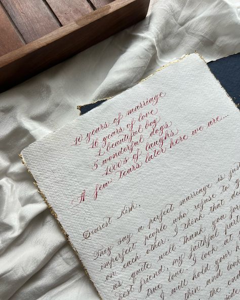 An old-school love letter on deckled-edge paper, gilded with gold and tied with a frayed ribbon. A timeless piece filled with deep emotions and cherished words.. . . #engravingart #engravingartist #engravedgifts #handwrittenletter #loveletter #decklededge #decklededgepaper #lovelletersforher #loveletterforhim #scrollletter #oldschoollove #delhicalligrapher #indiancalligrapher #indiancalligraphers #calligraphersinindia #indiancalligrapher Letter Aesthetic, Letter For Him, Deckled Edge Paper, Letter To Teacher, Deep Emotions, Old Letters, Engraving Art, Perfect Marriage, Old Love