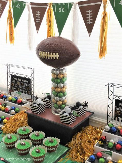 Football Treat Table Ideas, Football Candy Bar Ideas, Football Party Candy Table, Football Themed Table Centerpieces, Chargers Football Theme Party, Senior Football Table Ideas, Football Banquet Table Decorations, Football Candy Table, Football Theme Centerpieces