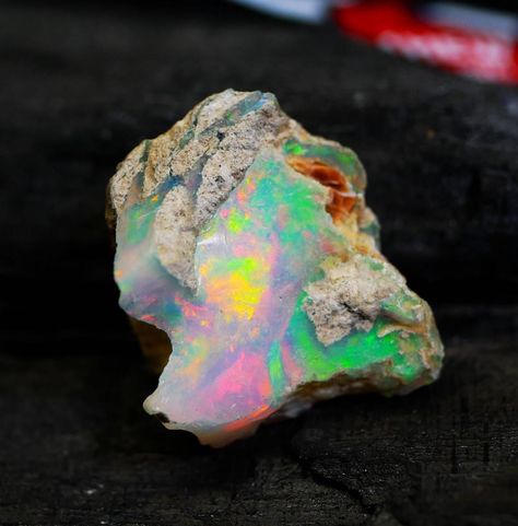 Dry Opal Rough, Ethiopian Opal Raw, Opal Rough, Big Opal Rough, Fire Opal Rough, Natural Loose Opal Welo Fire ,For Cut, 6.20 Cts. (B68) Welcome to Our Shop  Stone Name :- Dry Ethiopian Opal Rough Stone Weight :- 6.20 CTS Stone Type :- RAW B68 Opal Benefits : This gemstone provides Neuro-stability to its wearer as it creates a balance in between the left and right hemispheres of the brain. Wearer of an Opal gets benefits from it as it cures several problems related to eye, throat, spleen, bone marrow, pancreas and reproductive organs. Opal has a long history of being used by people as a good luck charm to bring happiness, wealth, and health into their lives. Opals come in a wide variety, with white opal being recognized as a health-healing stone. Opal can be used to effectively treat both i Precious Opal, Raw Opal, Bone Marrow, Luck Charm, Luck Charms, Long History, Bring Happiness, White Opal, Stone Names