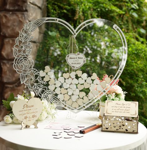 "✦ Heart Wedding Guest Book Alternative (Wood) Personalized Wedding Gift Wooden Floral Rustic Guest Book Alternative Personalized Wedding Gift ✦ The Rustic Personalized Wedding Guest Book Alternative is a unique and memorable way to remember the guests who attended your special day. This guest book adds a charming decor element to your wedding and provides a space for your guests to leave their names and well wishes for you.  This versatile guest book can be used for many other special events su Wedding Guest Book Alternative Wood, Rustic Guest Book, Heart Guest Book, March Wedding, Personalized Wedding Guest Book, Wedding Guest Book Alternative, Rustic Wedding Guest Book, Wood Personalized, Personalized Wedding Gift