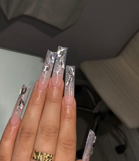 Silver Nails Ideas Long, Grey Nail Designs With Rhinestones, Blinged Out Silver Nails, Long Silver Nails Acrylic, Boujie Nails Acrylic, Baddie Silver Nails, Silver Glitter Nails With Rhinestones, Silver Nails Prom Acrylics, Long Black And Silver Nails